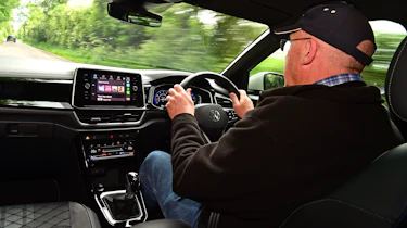 Auto Express products editor Kim Adams driving the Volkswagen T-Roc