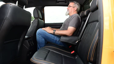 Auto Express senior test editor Dean Gibson sitting in the back of the Ford Ranger