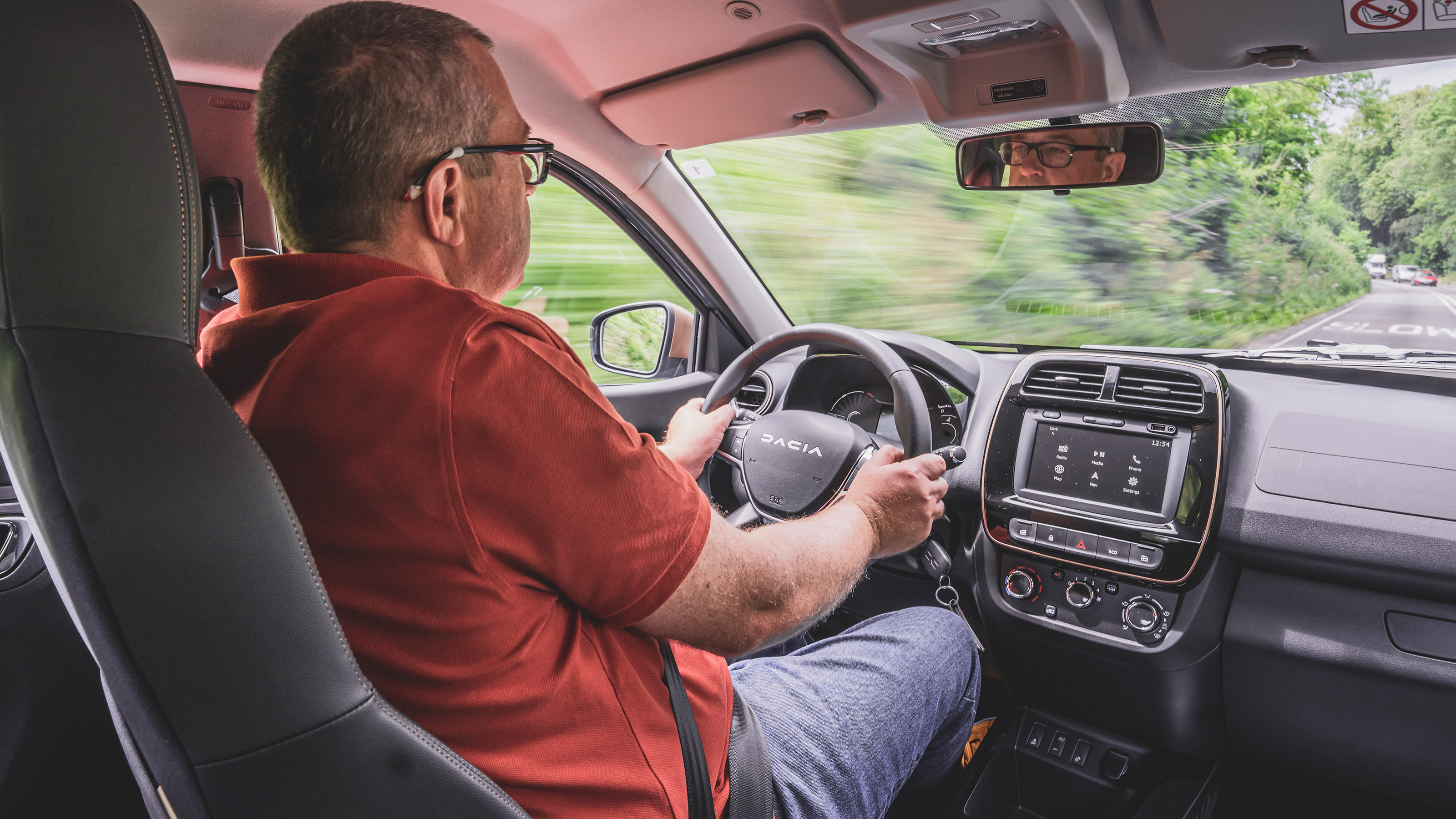 Editor-at-Large John McIlroy driving the Dacia Spring