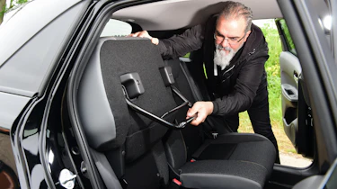 Auto Express senior test editor Dean Gibson testing Honda Jazz magic seats