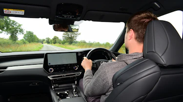 Auto Express staff writer Alastair Crooks driving the Lexus RX 500h