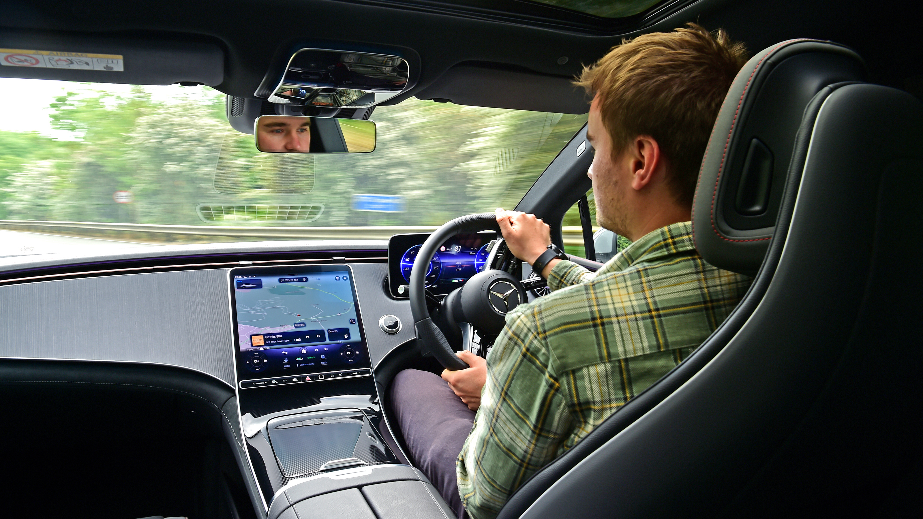 Auto Express staff writer Alastair Crooks driving the Mercedes EQE 300