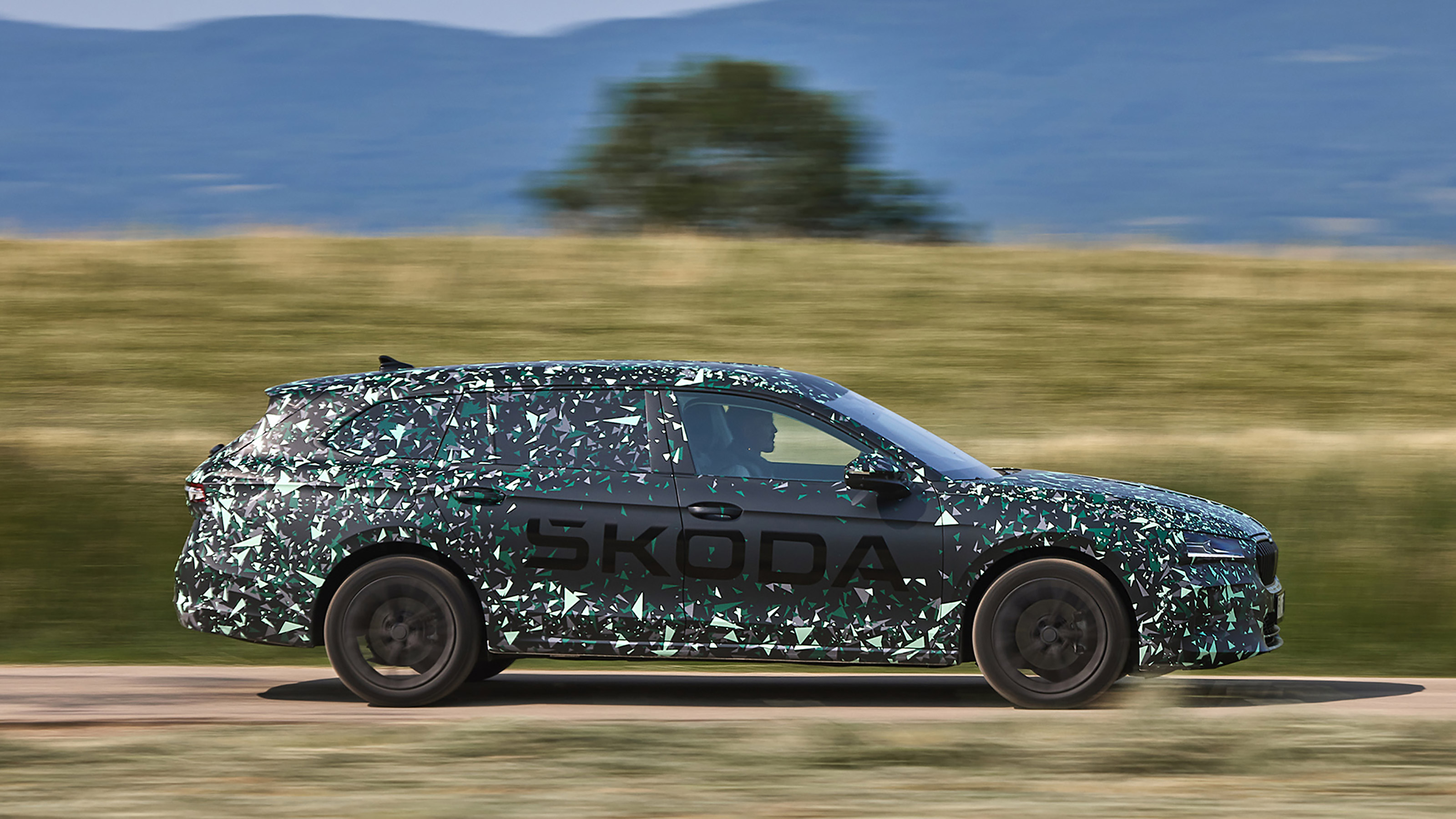 Skoda Superb Estate prototype - side