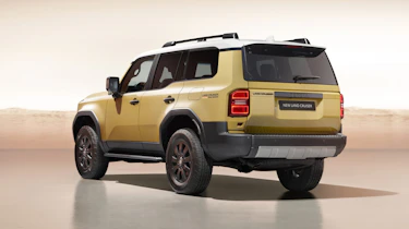 Toyota Land Cruiser (beige) - rear static