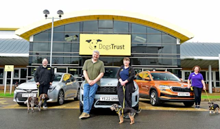 Auto Express current affairs and features editor Chris Rosamond with members of the Dogs Trust