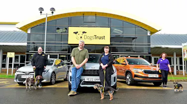 Auto Express current affairs and features editor Chris Rosamond with members of the Dogs Trust