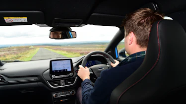 Auto Express staff writer Alastair Crooks driving the Ford Puma ST Powershift