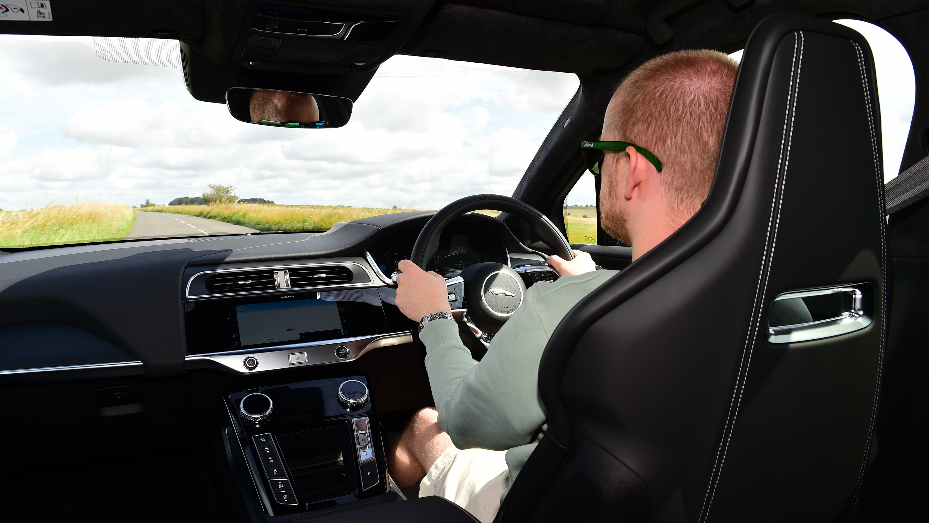 Auto Express chief reviewer Alex Ingram driving the facelifted Jaguar I-Pace