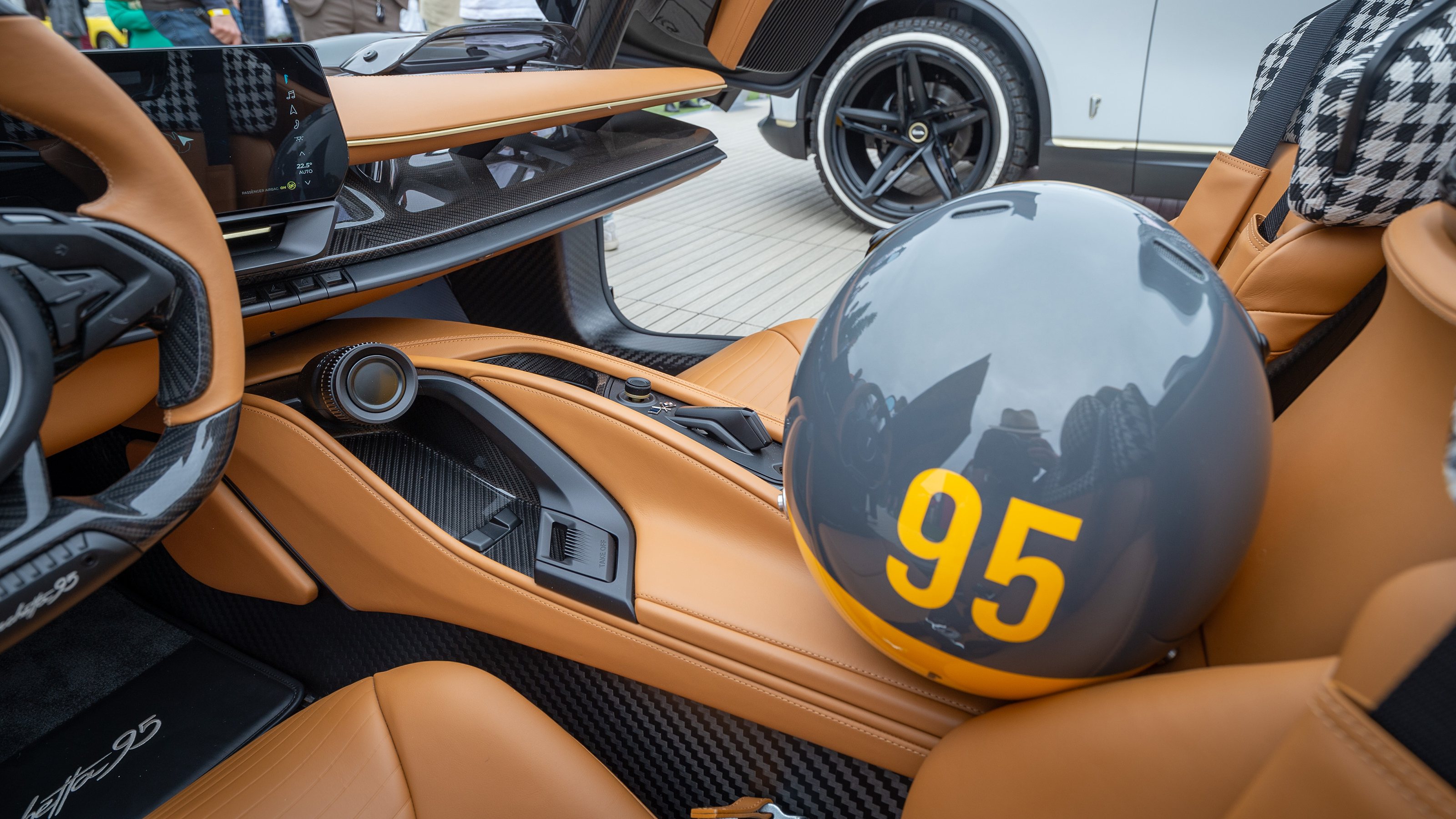 Pininfarina B95 on display at 2023 Monterey Car Week - crash helmet in interior