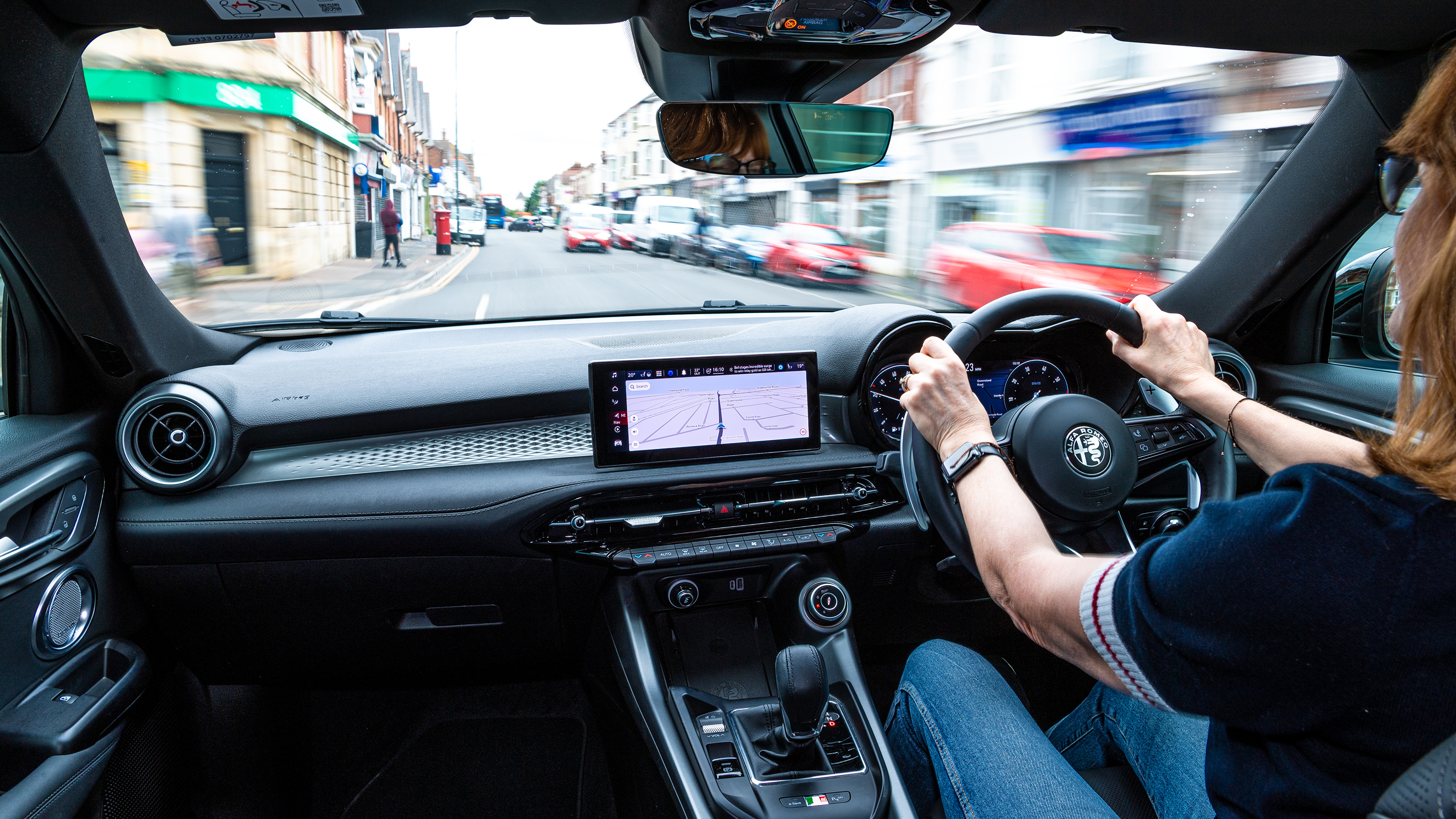 Auto Express pictures editor Dawn Grant driving the Alfa Romeo Tonale PHEV