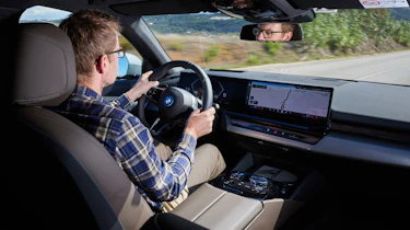 Sean Carson driving the BMW i5