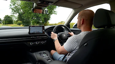 Auto Express chief reviewer Alex Ingram driving the Honda ZR-V in the UK
