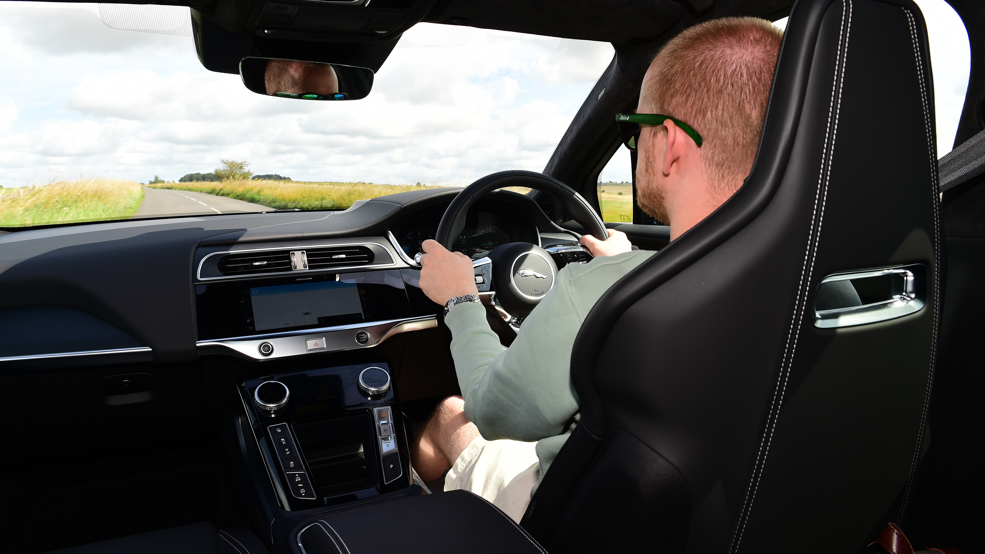 Auto Express chief reviewer Alex Ingram driving the 2024 Jaguar I-Pace in the UK