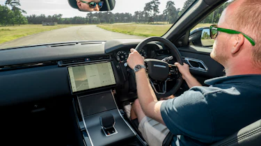 Auto Express chief reviewer Alex Ingram driving the facelifted Range Rover Velar in the UK