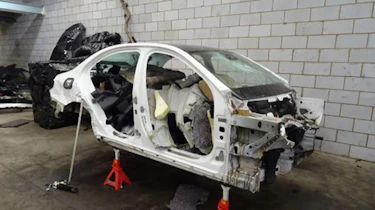 Chop shop - car broken for parts
