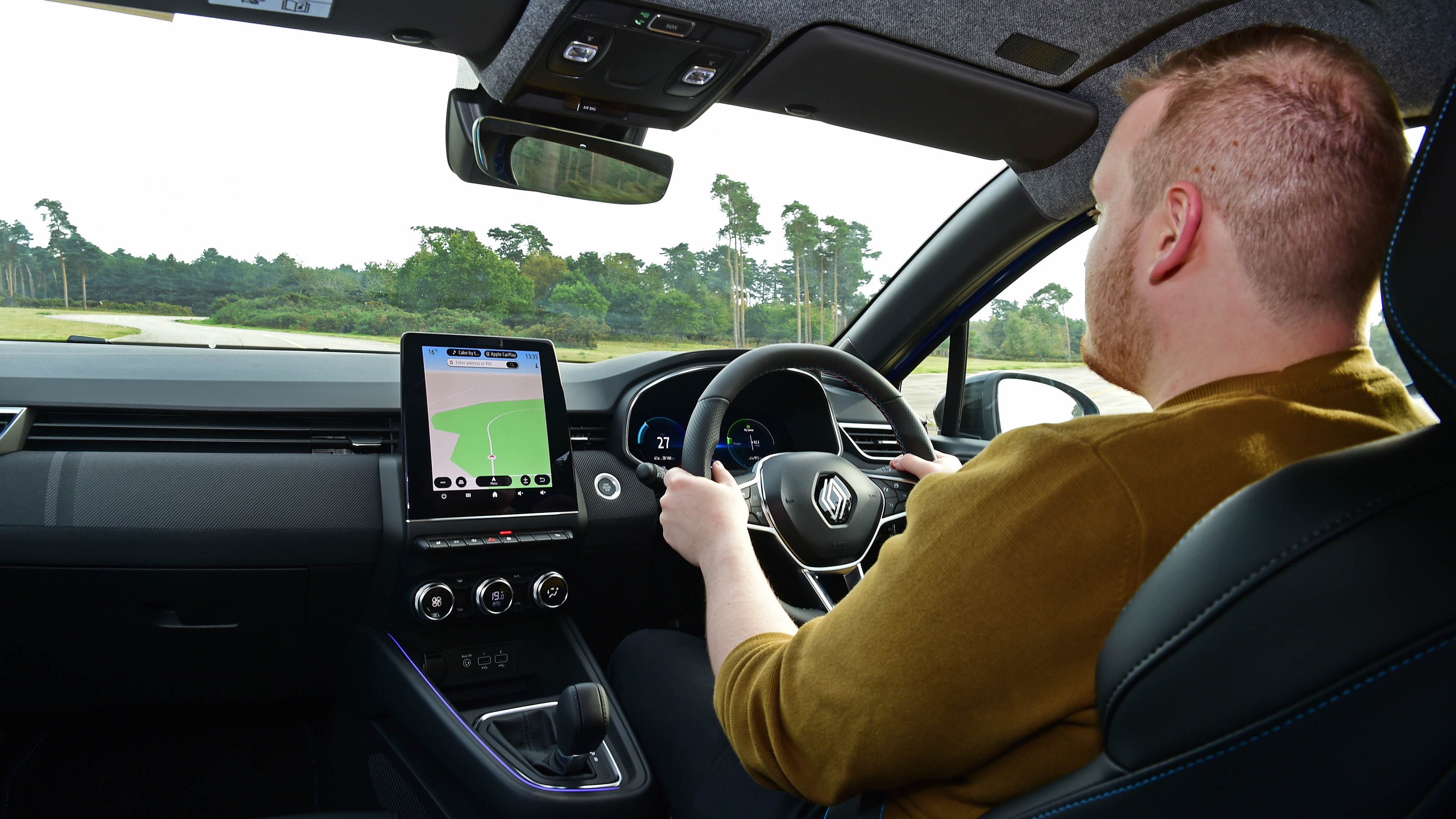 Auto Express news reporter Ellis Hyde driving the Renault Clio