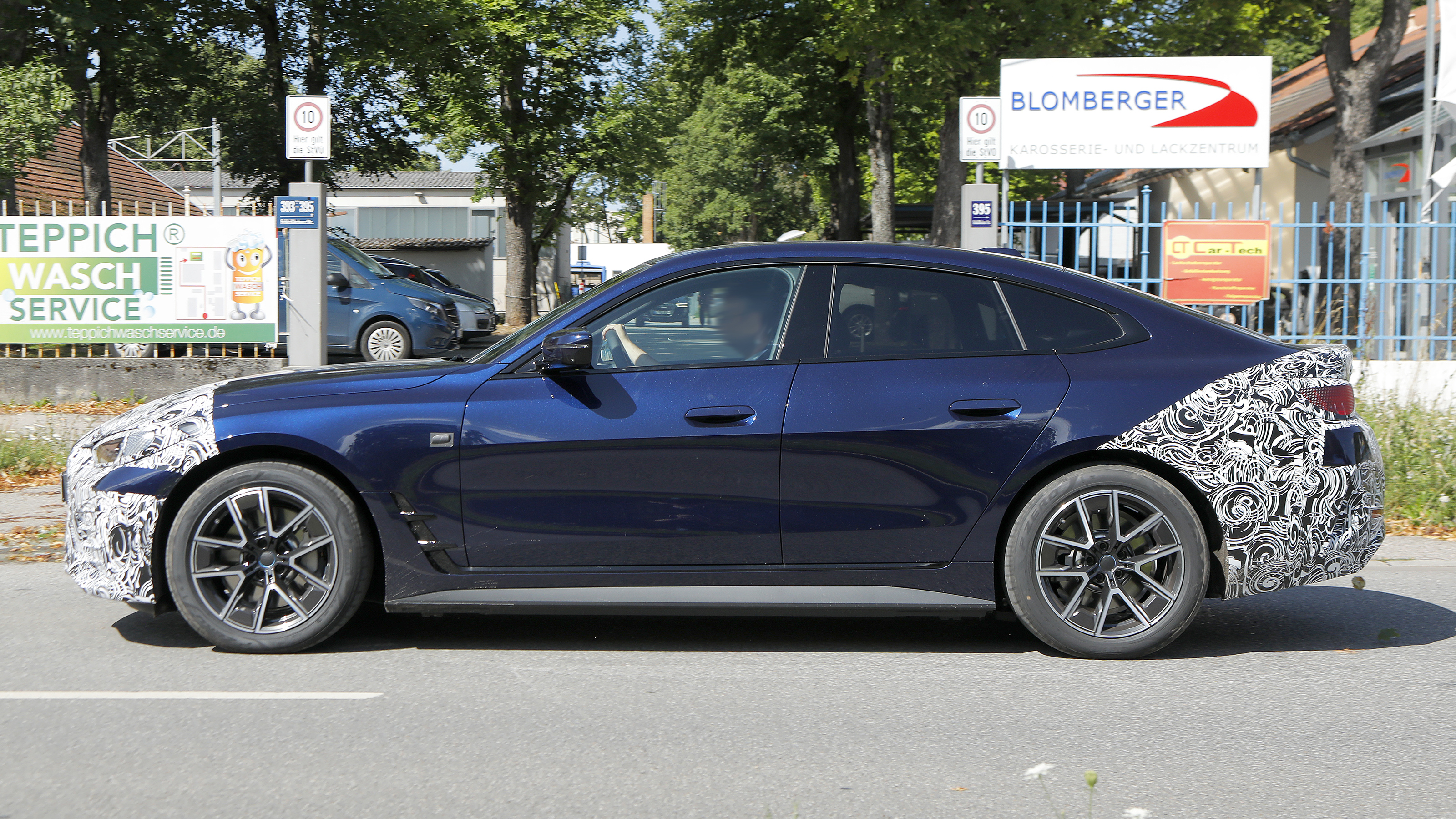 Facelifted BMW i4 - side