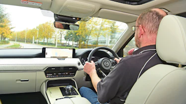 Auto Express chief sub-editor Andy Pringle driving the Mazda CX-60