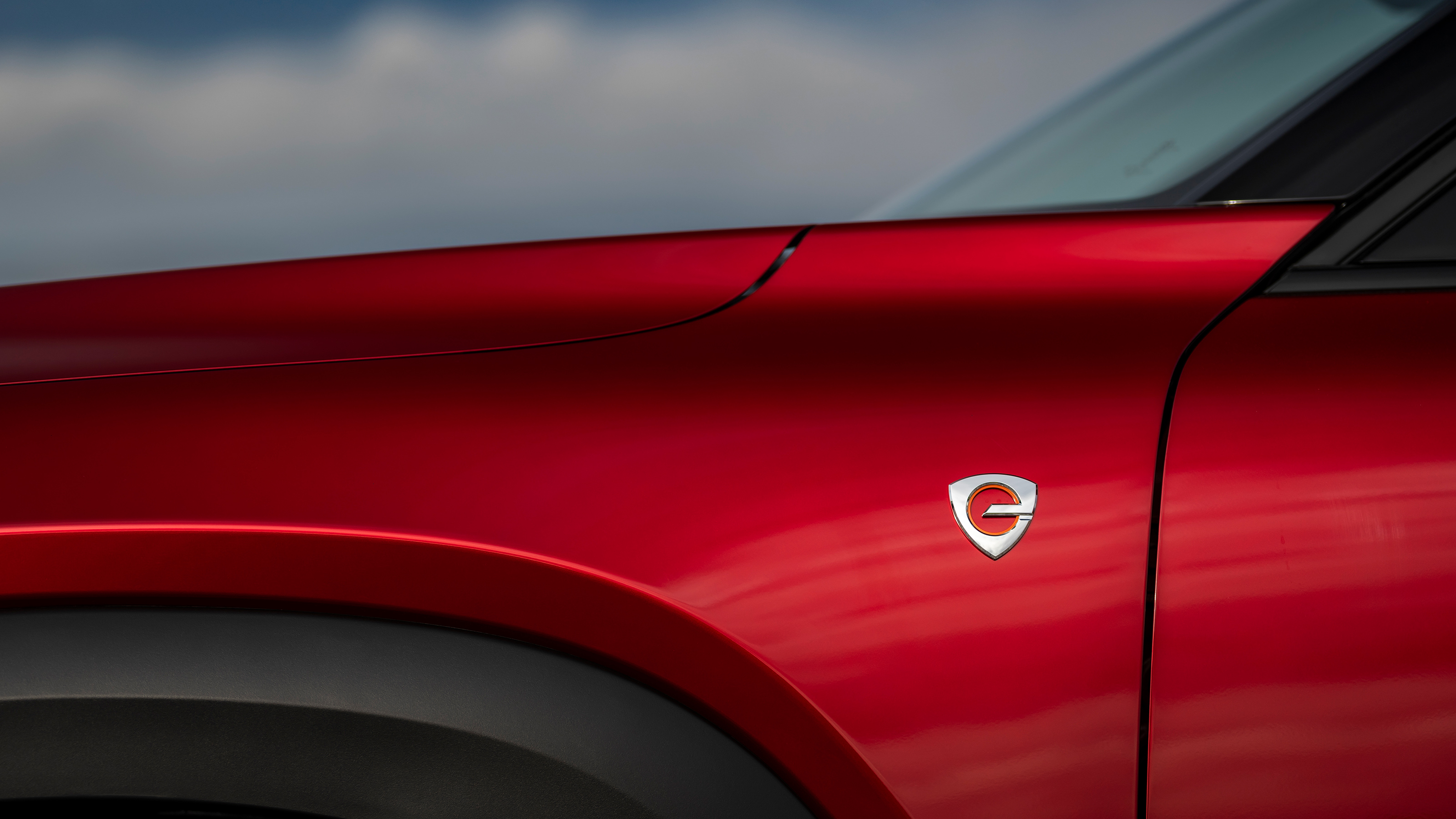 Mazda MX-30 R-EV - front wing badge