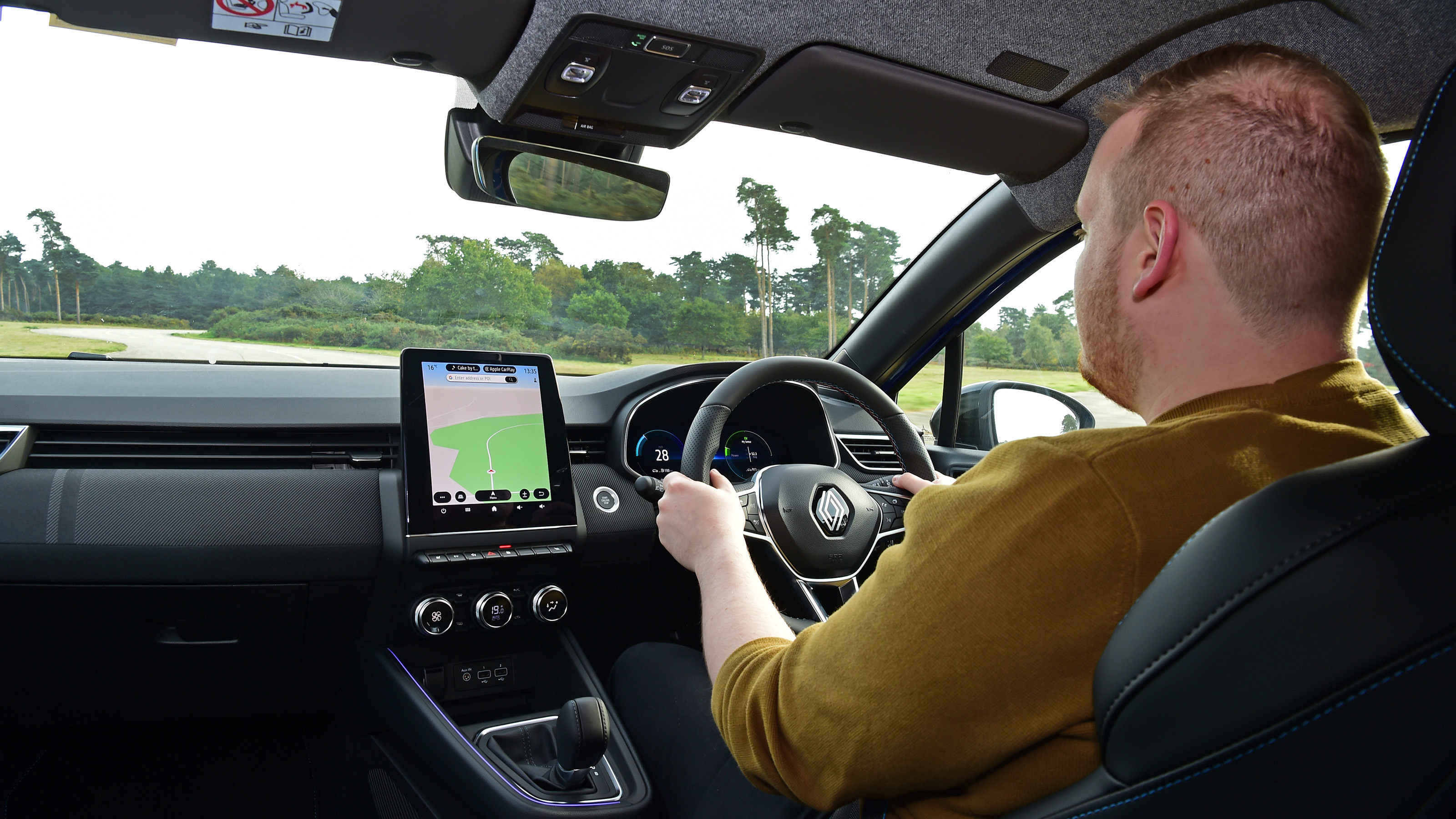 Auto Express news reporter Ellis Hyde driving the facelifted Renault Clio in the UK