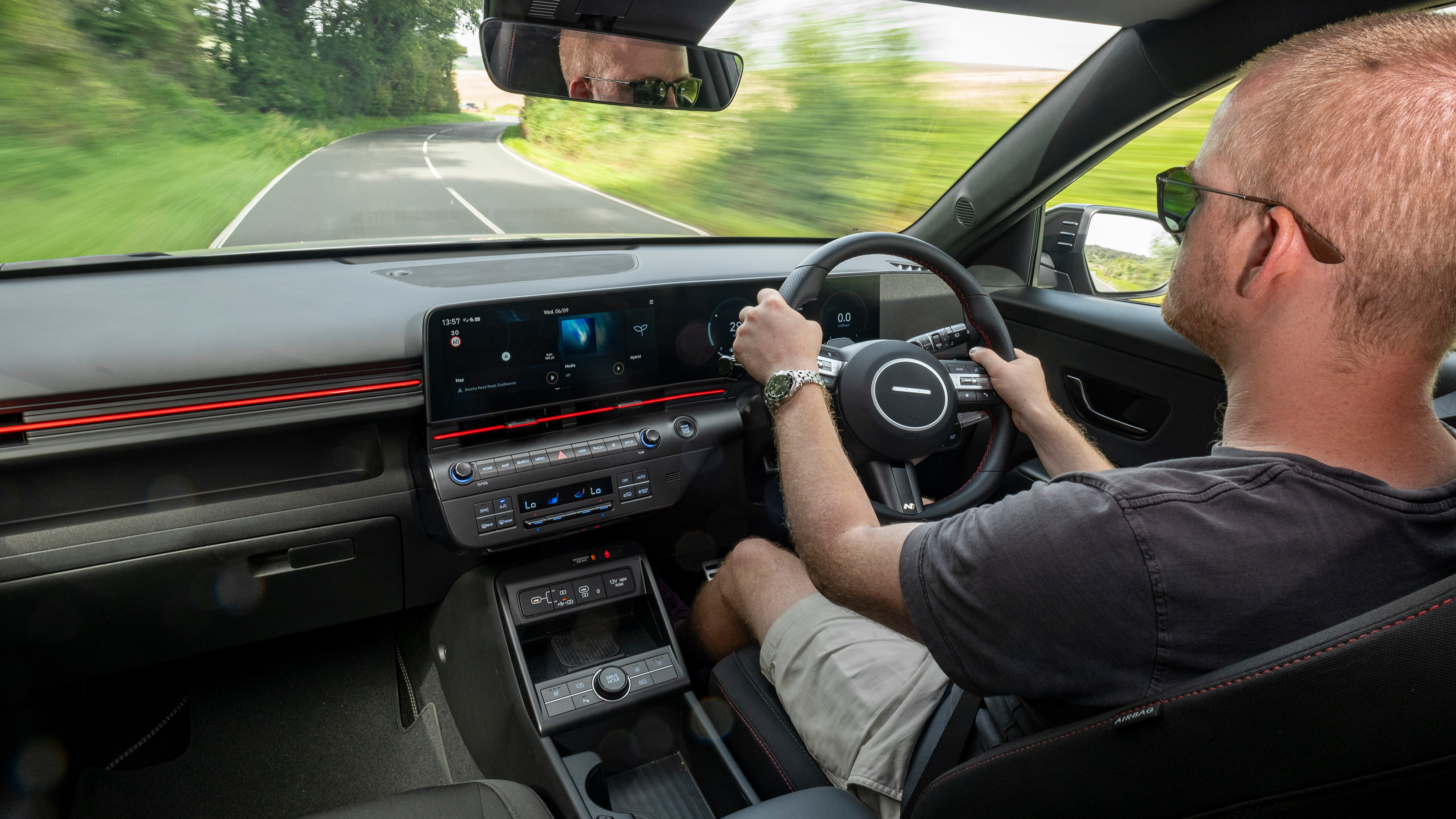 Auto Express chief reviewer Alex Ingram driving the Hyundai Kona
