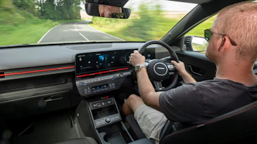 Auto Express chief reviewer Alex Ingram driving the Hyundai Kona