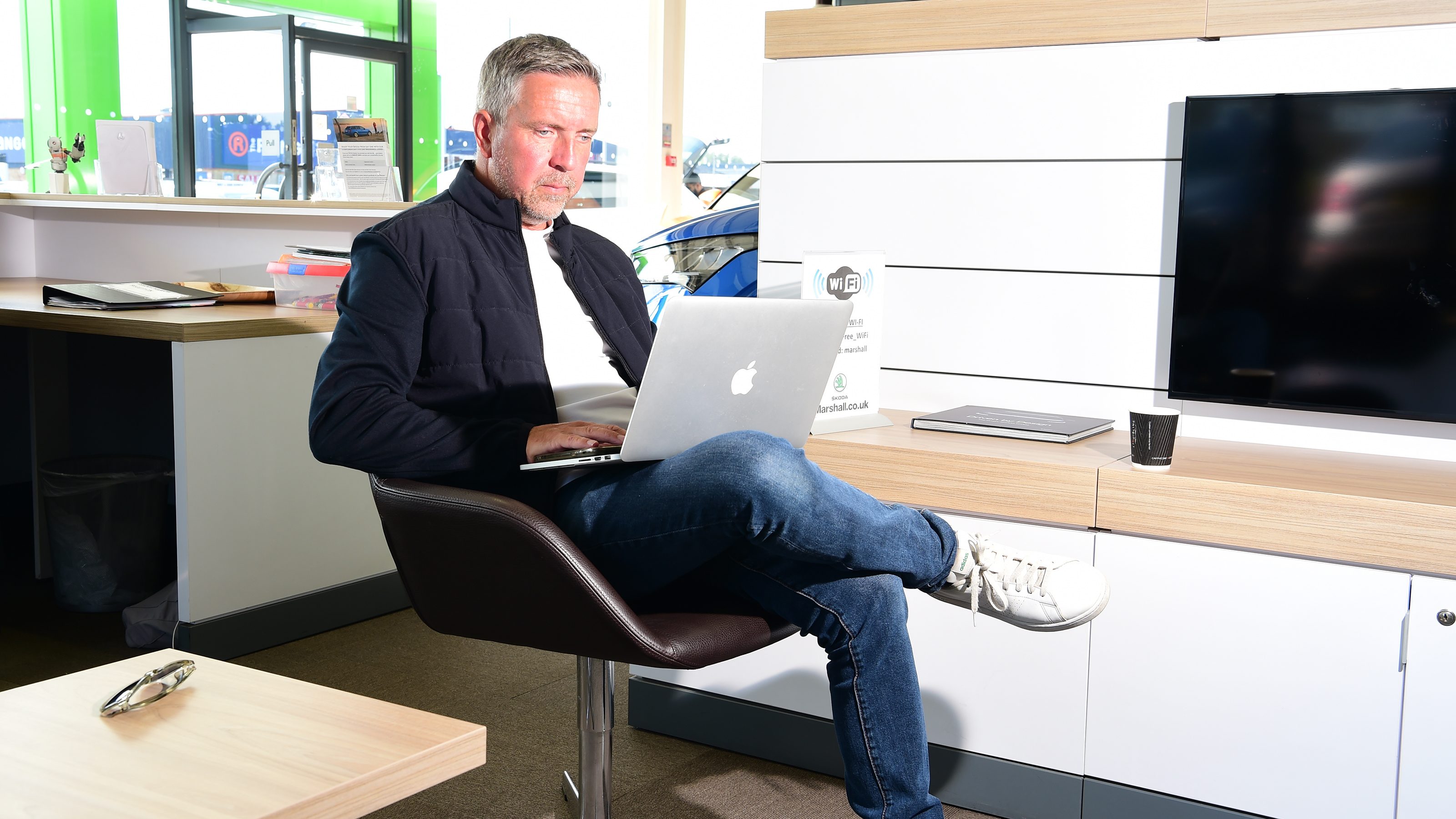 Auto Express staff photographer Pete Gibson browsing on an Apple Macbook