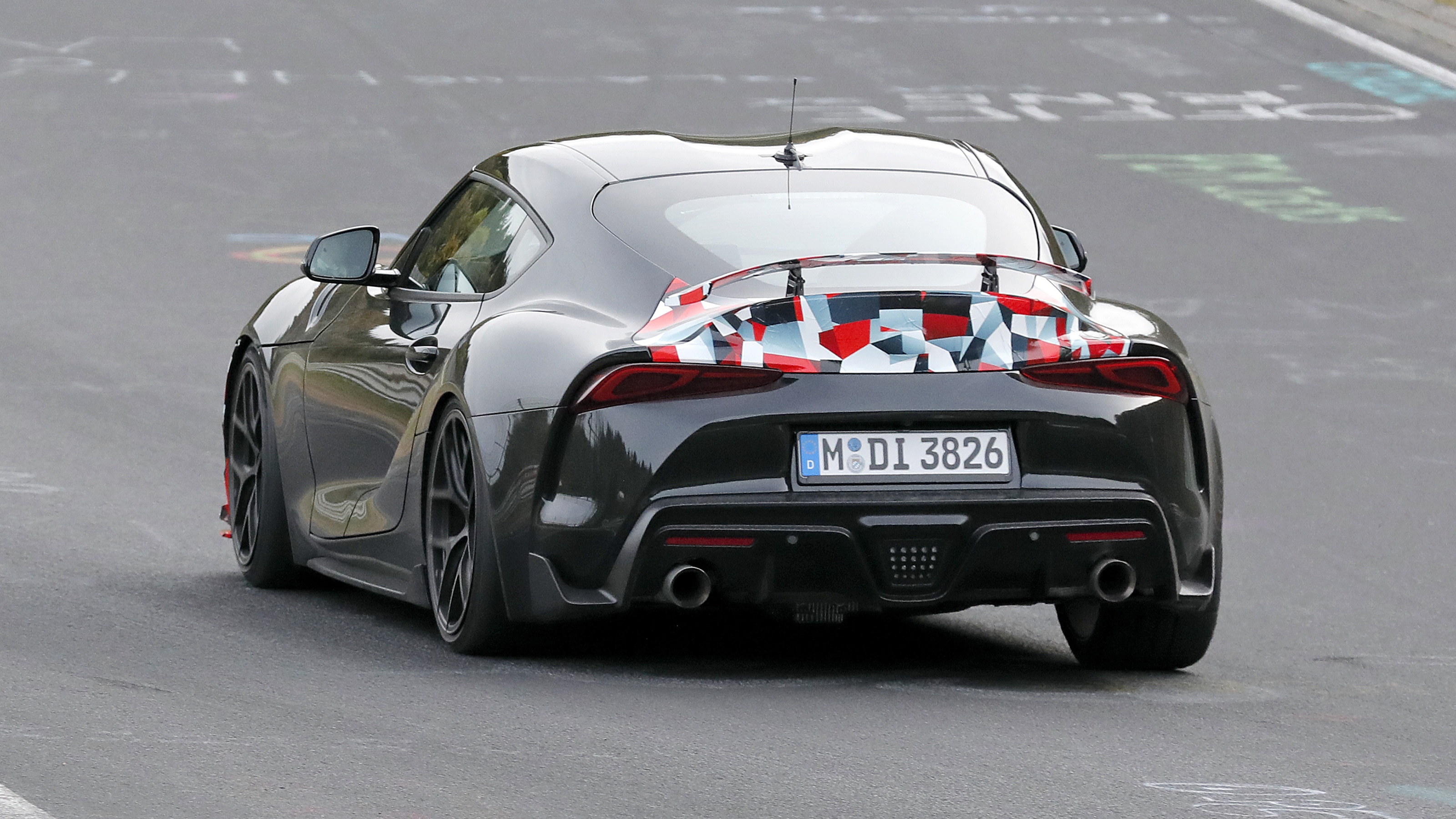 Toyota Supra GRMN (camouflaged) – rear cornering