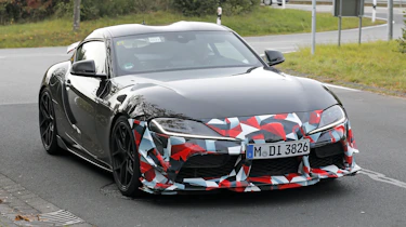 Toyota Supra GRMN (camouflaged) – front 3/4 action