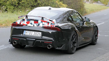 Toyota Supra GRMN (camouflaged) – rear 3/4 action