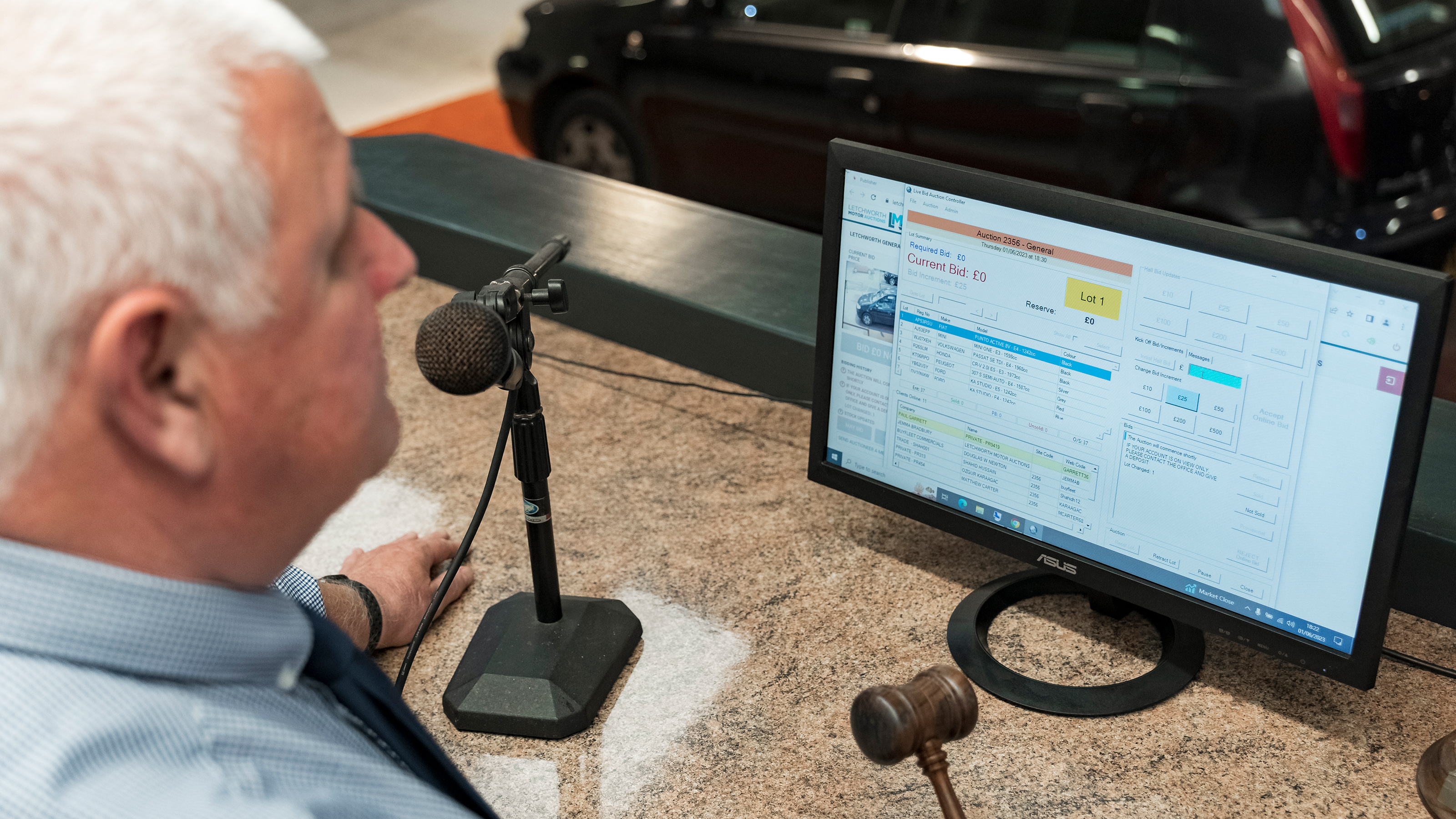 Jim Ronan looking at auction data