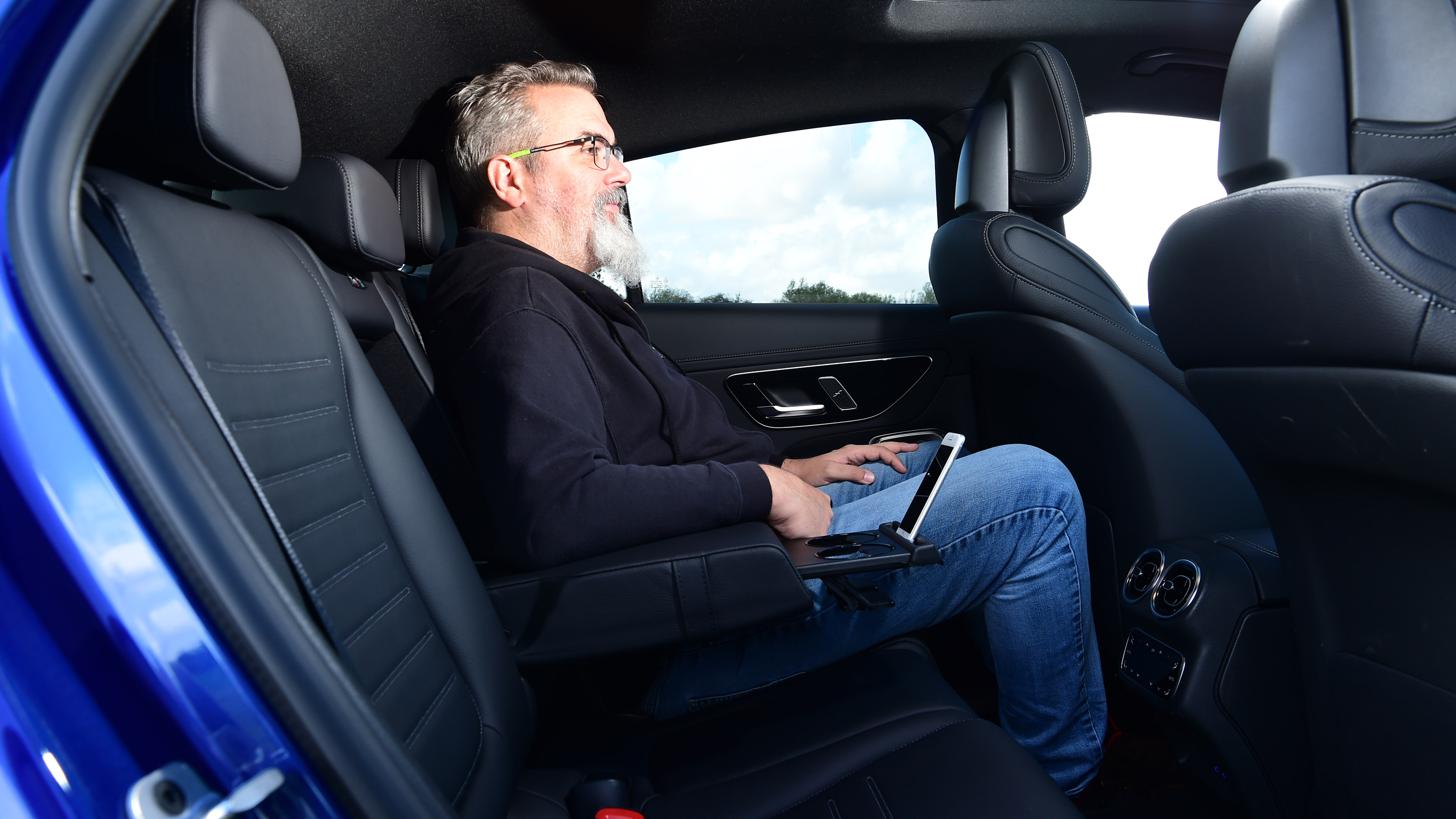 Auto Express senior road test editor Dean Gibson sitting in the Mercedes GLC's rear seat