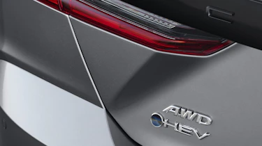 Toyota Camry 2024 official - hybrid badge