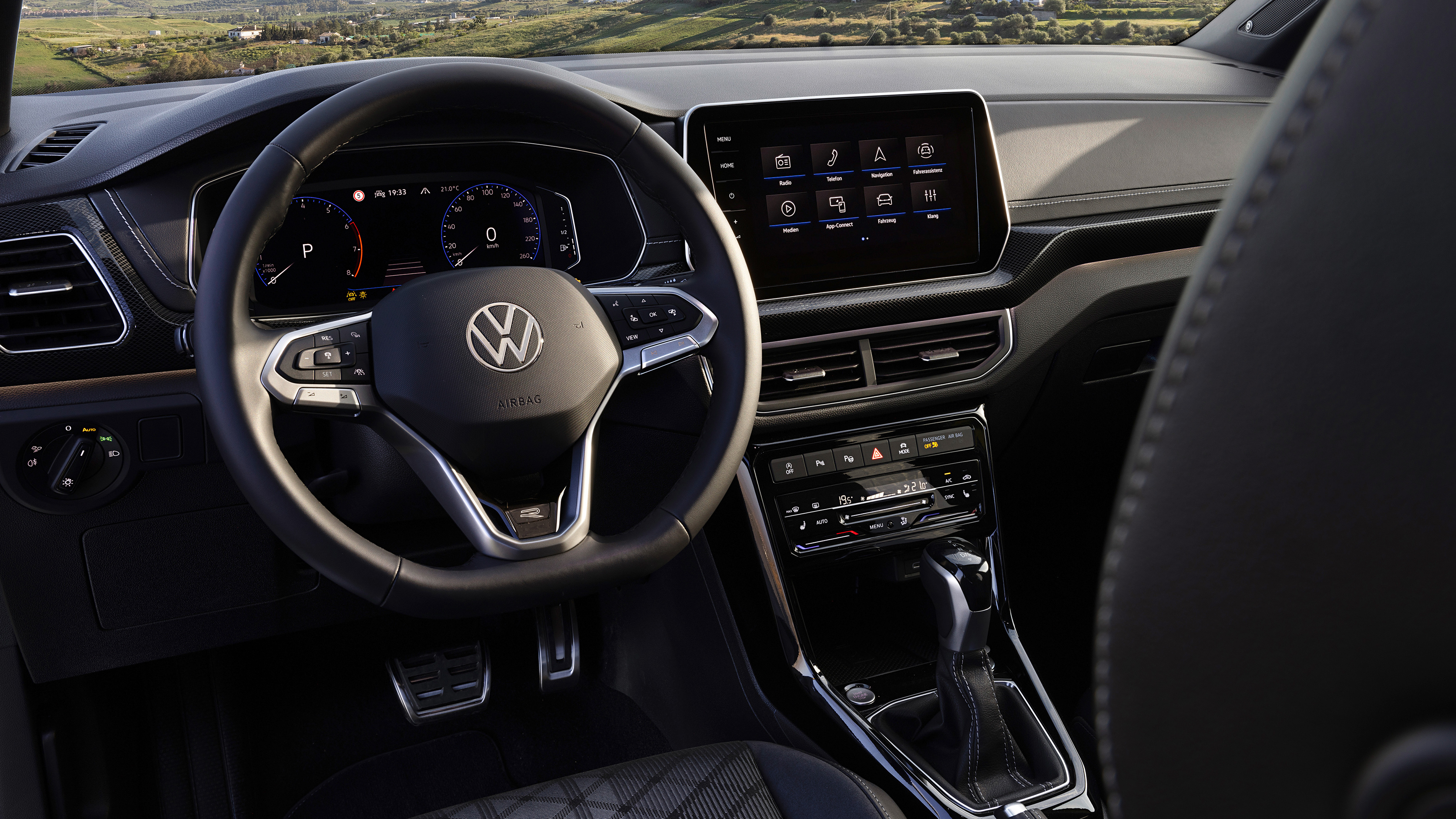 2024 Volkswagen T-Cross - steering wheel and infotainment screen