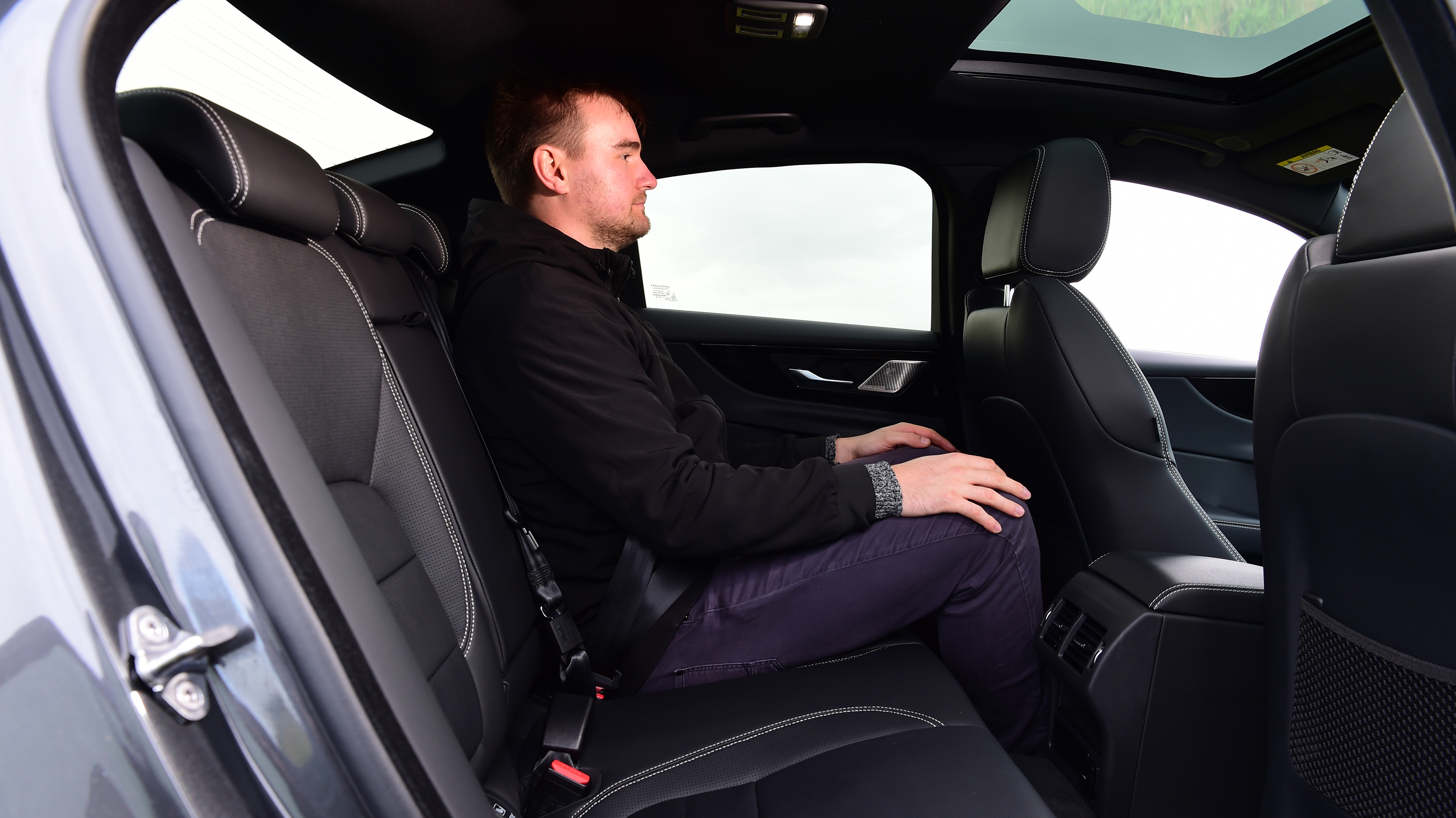 2023 Jaguar XE - rear seats with Auto Express senior writer Alastair Crooks