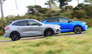 Ford Kuga and Vauxhall Grandland - side action