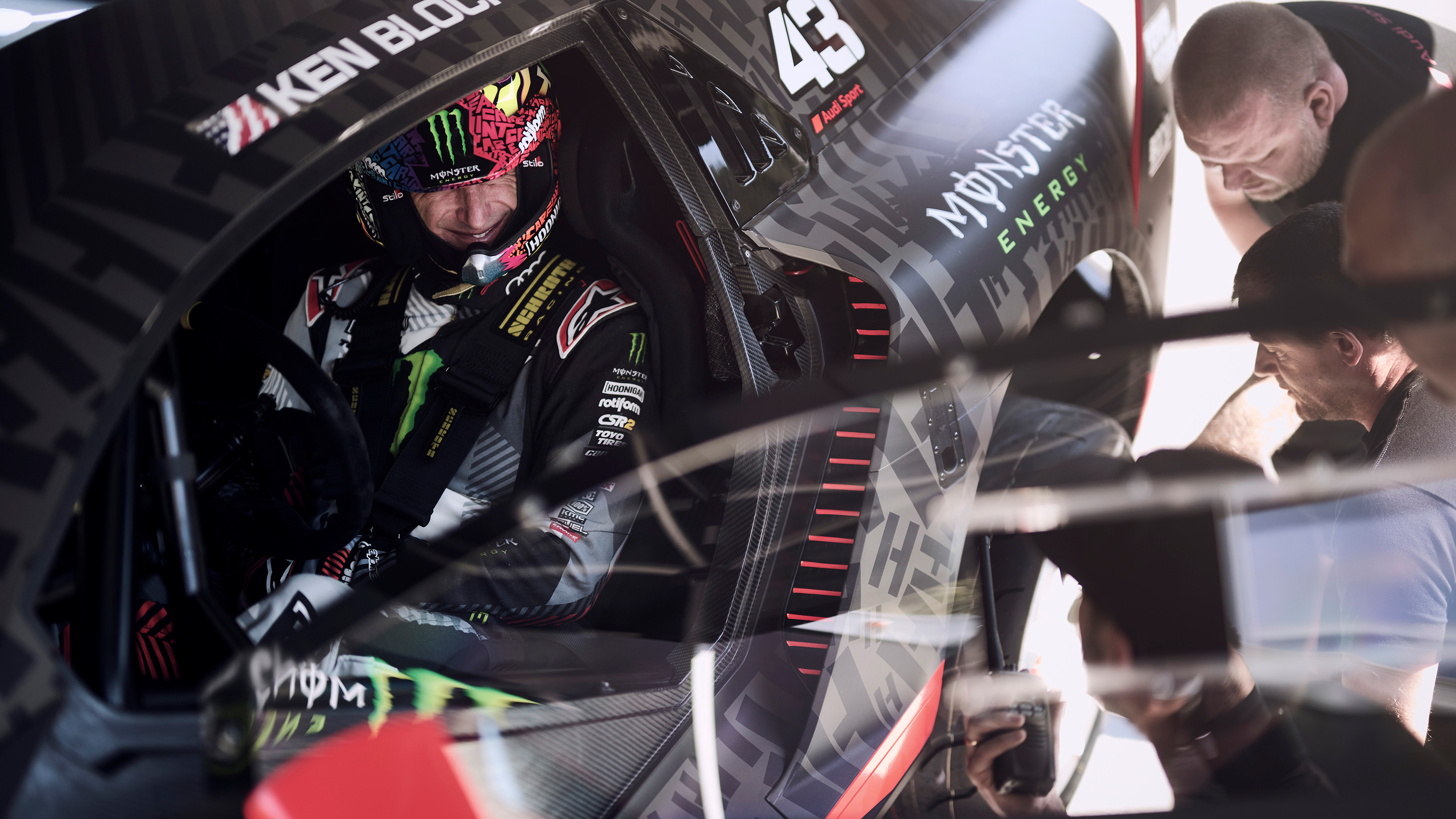 Ken Block sitting in the Audi S1 e-tron quattro Hoonitron