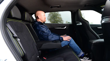 Kia EV6 GT vs Ford Mustang Mach E-GT - Kia rear seats with Auto Express Chief reviewer Alex Ingram