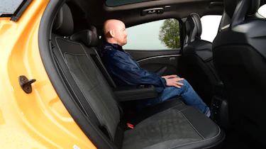 Kia EV6 GT vs Ford Mustang Mach E-GT - Ford rear seats with Auto Express Chief reviewer Alex Ingram