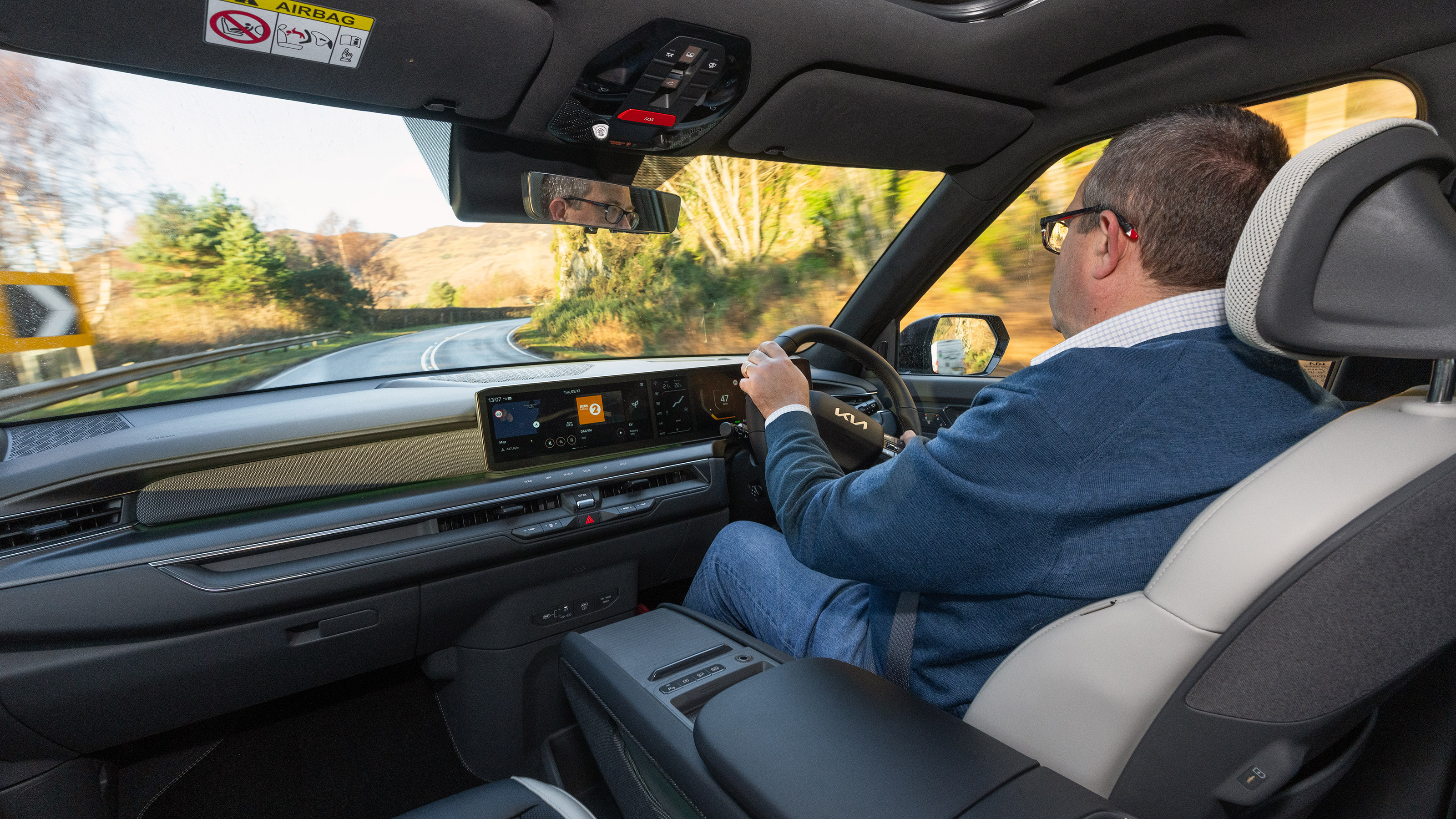 John McIlroy driving the Kia EV9