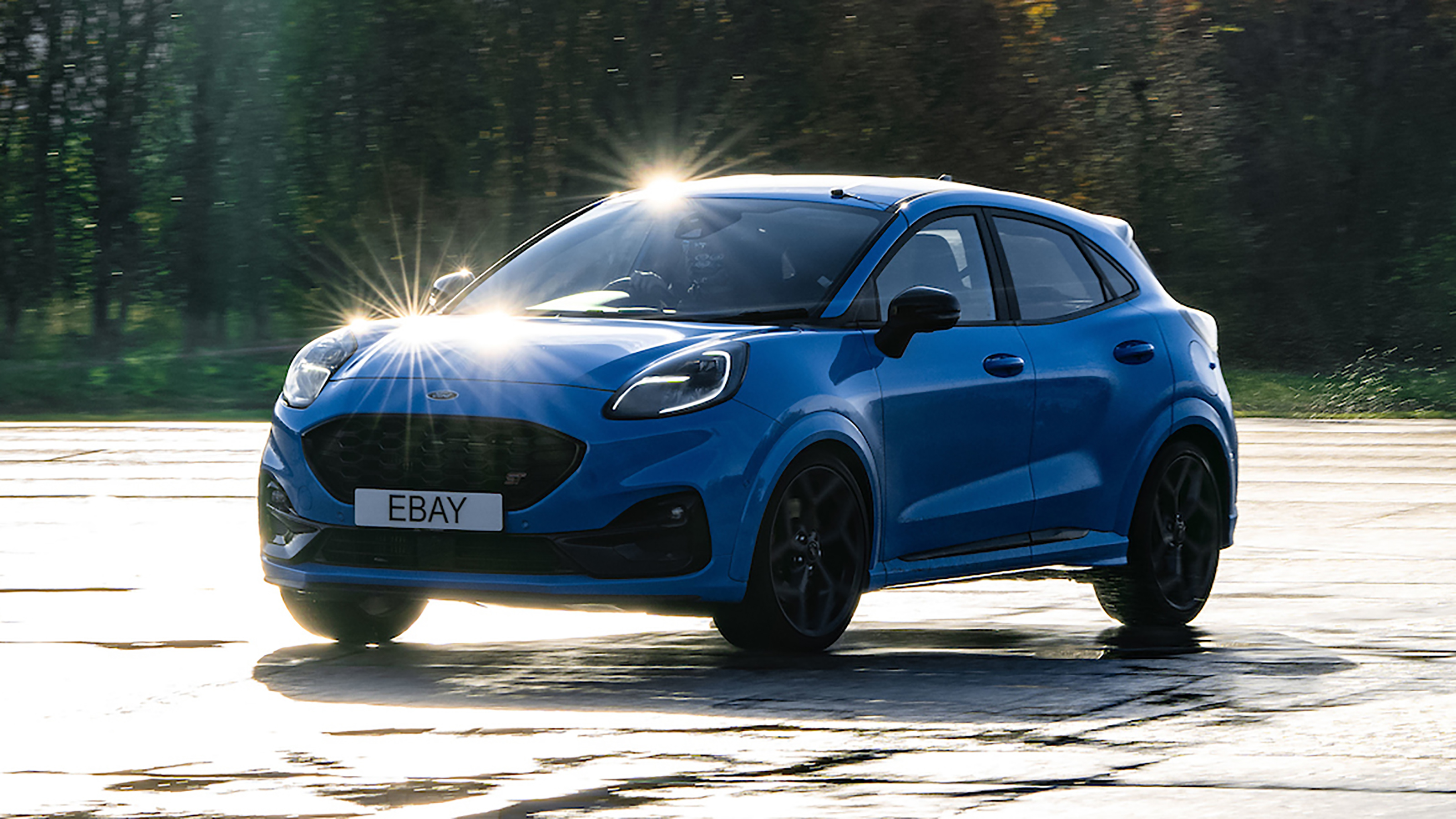 Ford Puma being used for tyre testing in wet
