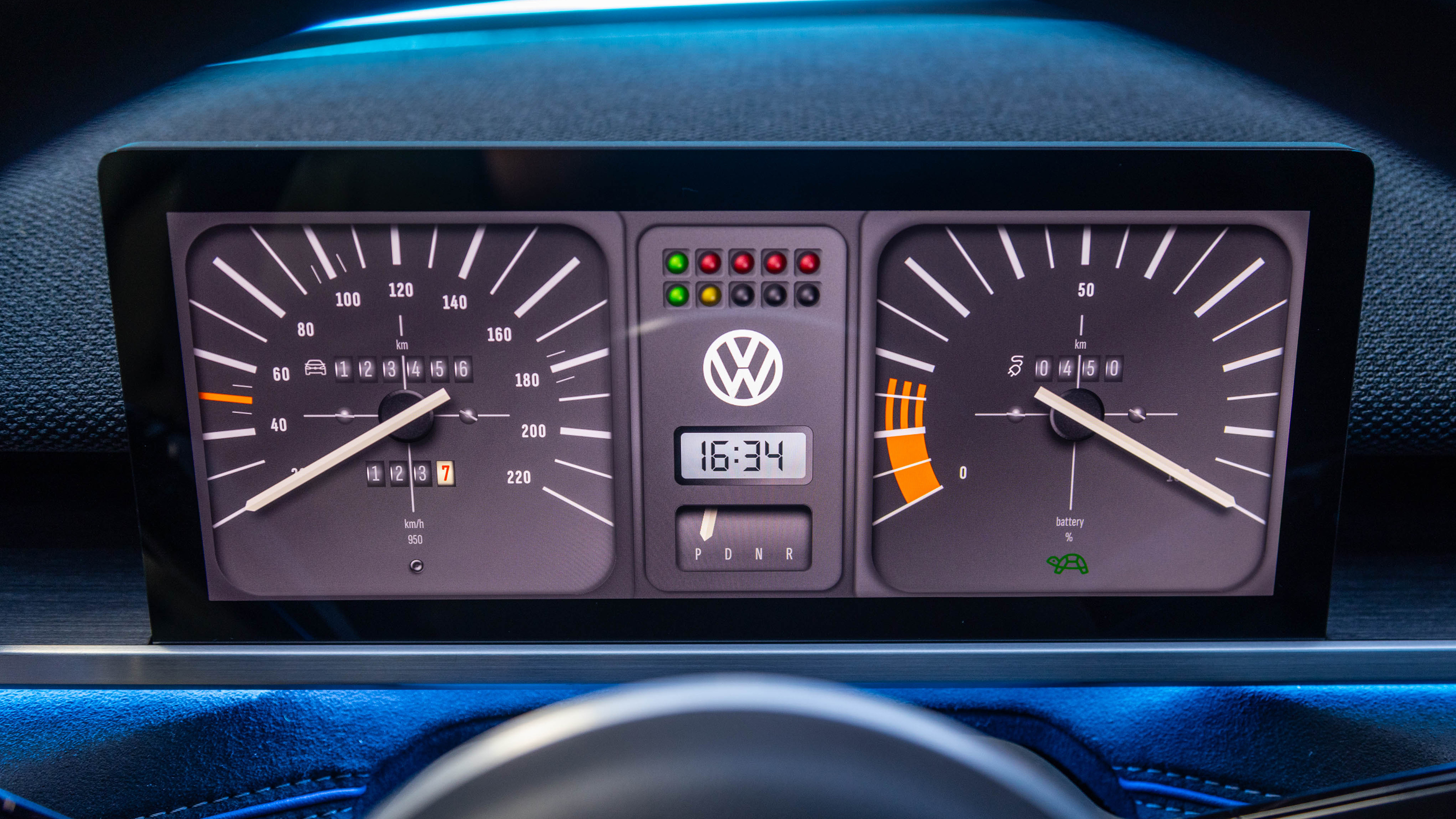 VW ID.2All concept interior - dashboard screen displaying classic VW Golf gauges