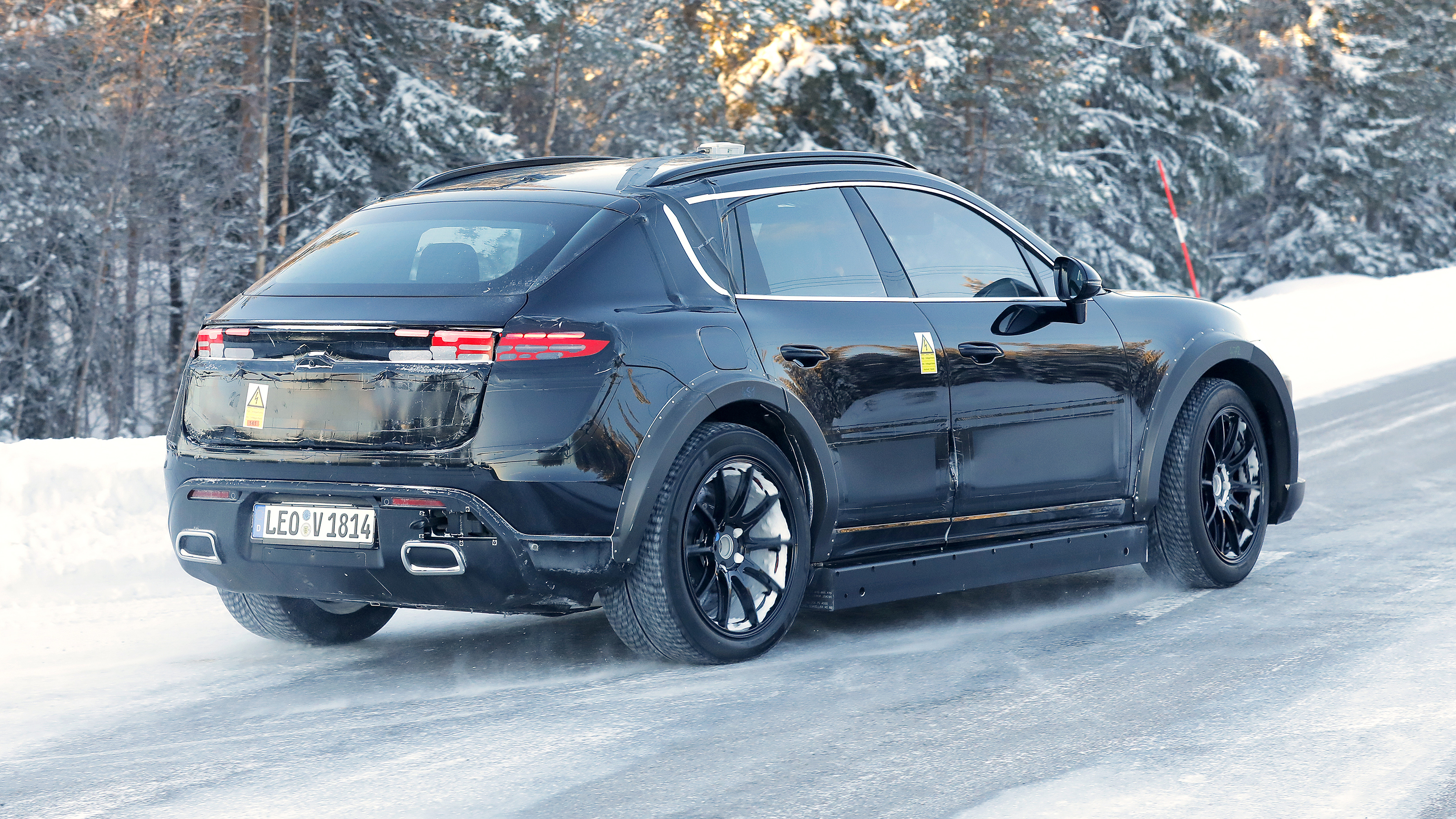 Porsche Cayenne (camouflaged) - rear 3/4