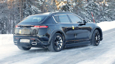 Porsche Cayenne (camouflaged) - rear 3/4