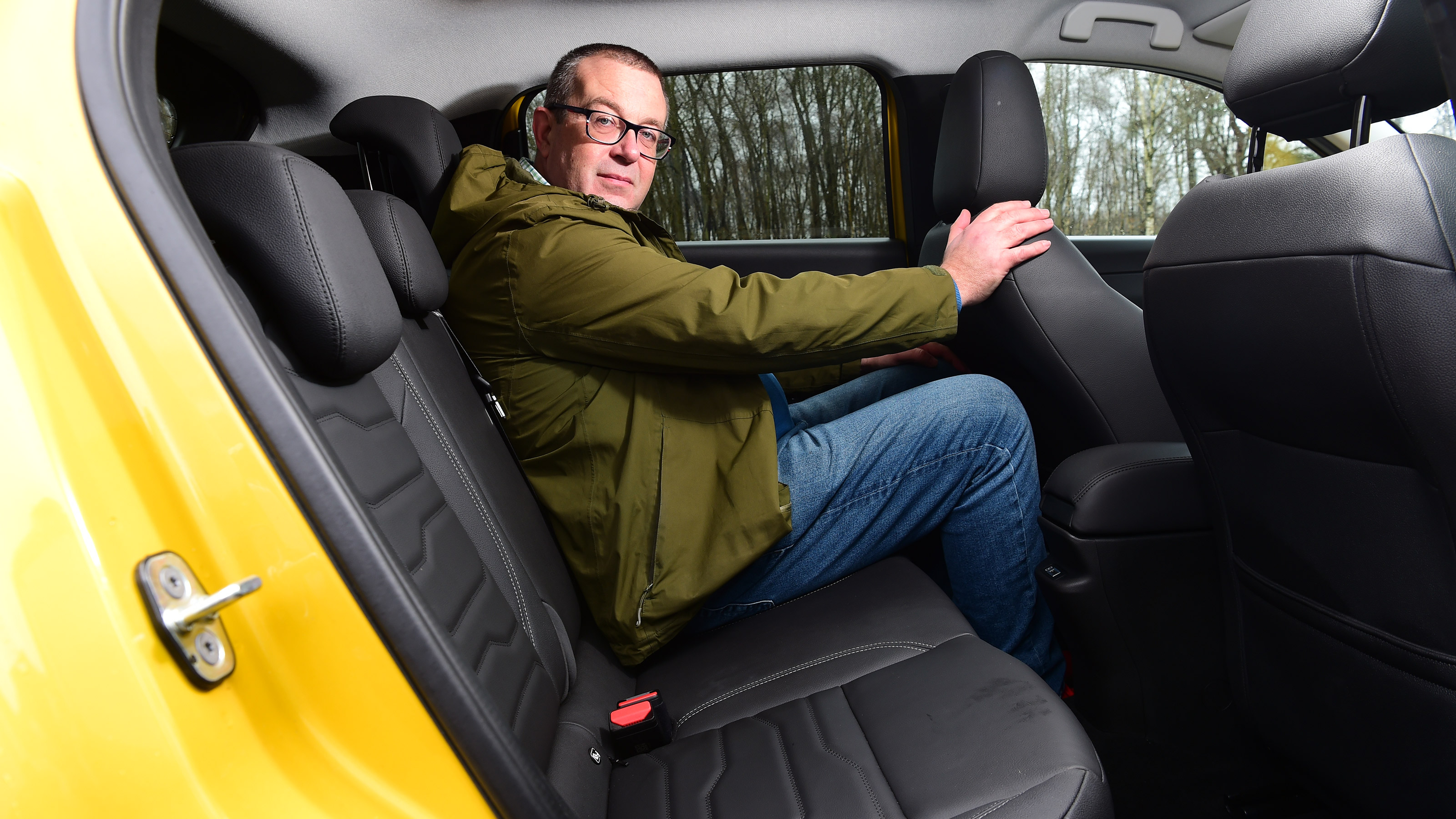 John McIlroy sitting in the Jeep Avenger Summit