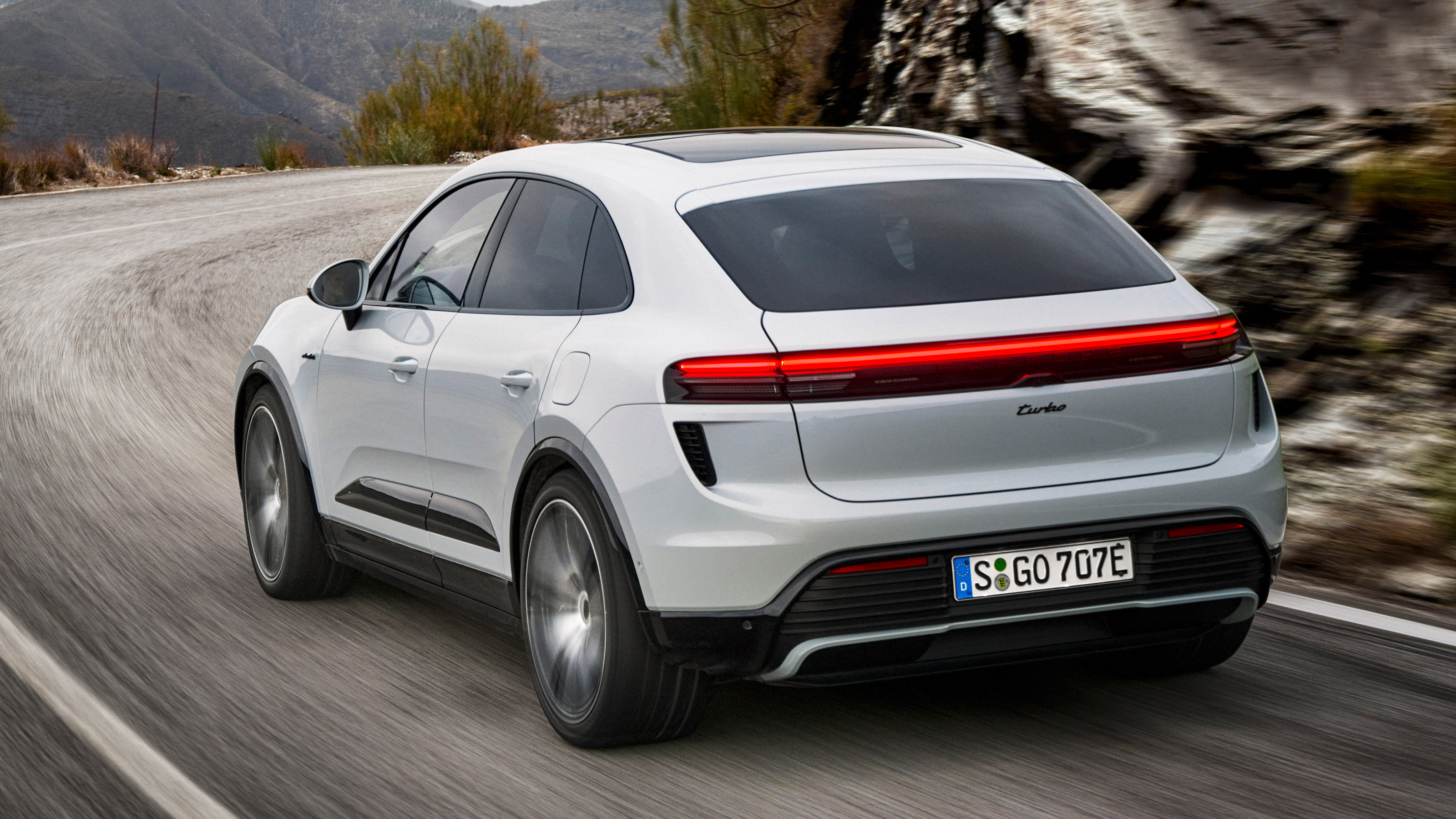 Porsche Macan EV - rear action