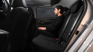 Vauxhall Corsa vs Hyundai i20 - Hyundai rear seats with Auto Express senior staff writer Jordan Katsianis