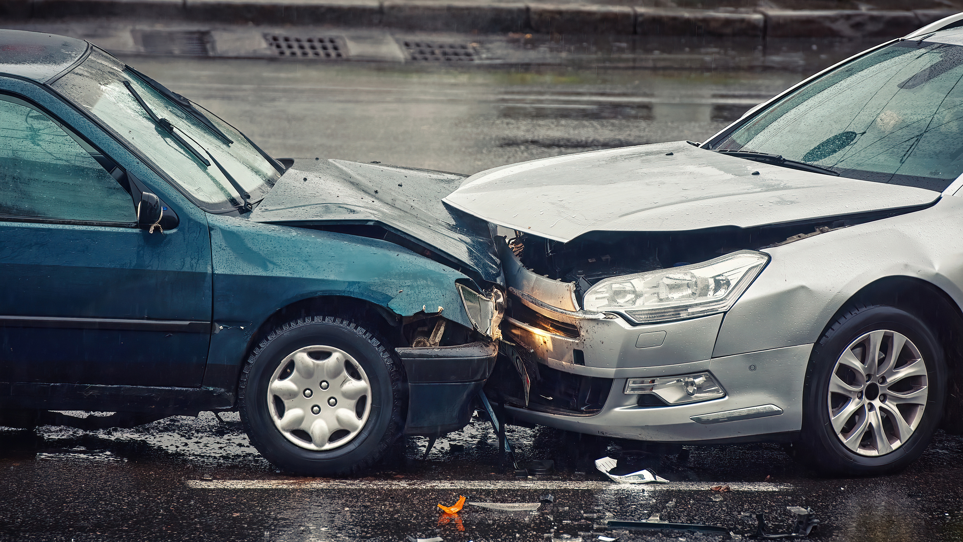 Two cars in a head-on collision