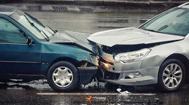 Two cars in a head-on collision