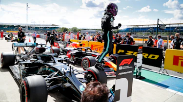 Lewis Hamilton stepping out of F1 car
